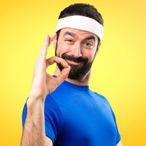 Funny,Sportsman,Making,Ok,Sign,On,Colorful,Background